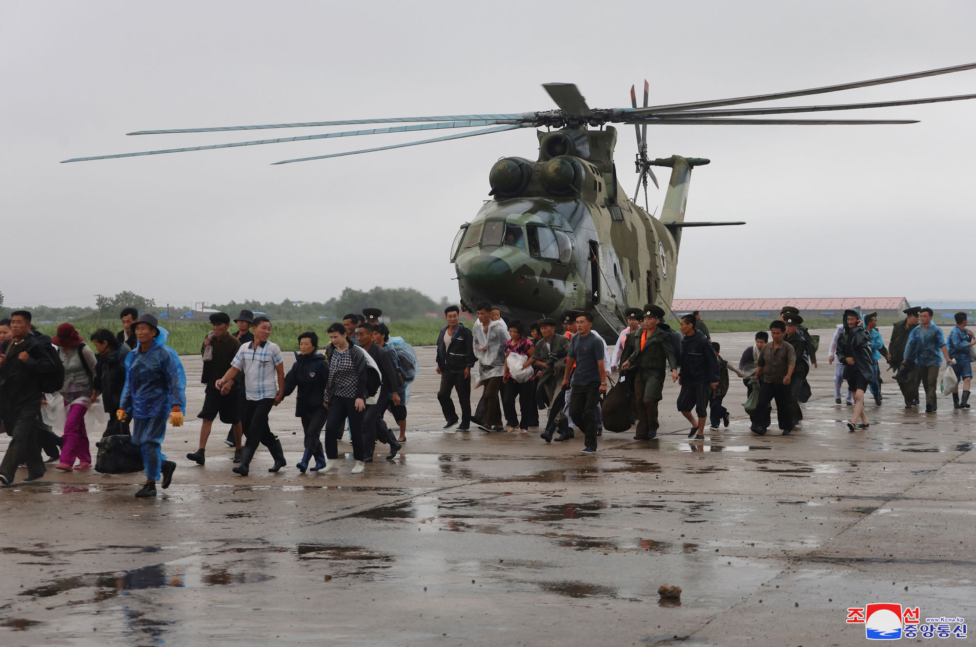 President of State Affairs <nobr><span style="font-size:110%;">Kim Jong Un</span></nobr> inspects flood-hit areas in city of Sinuiju and Uiju County of North Phyongan Province