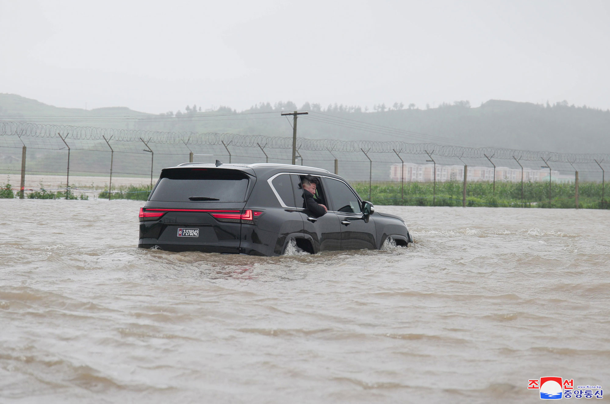 President of State Affairs <nobr><span style="font-size:110%;">Kim Jong Un</span></nobr> inspects flood-hit areas in city of Sinuiju and Uiju County of North Phyongan Province