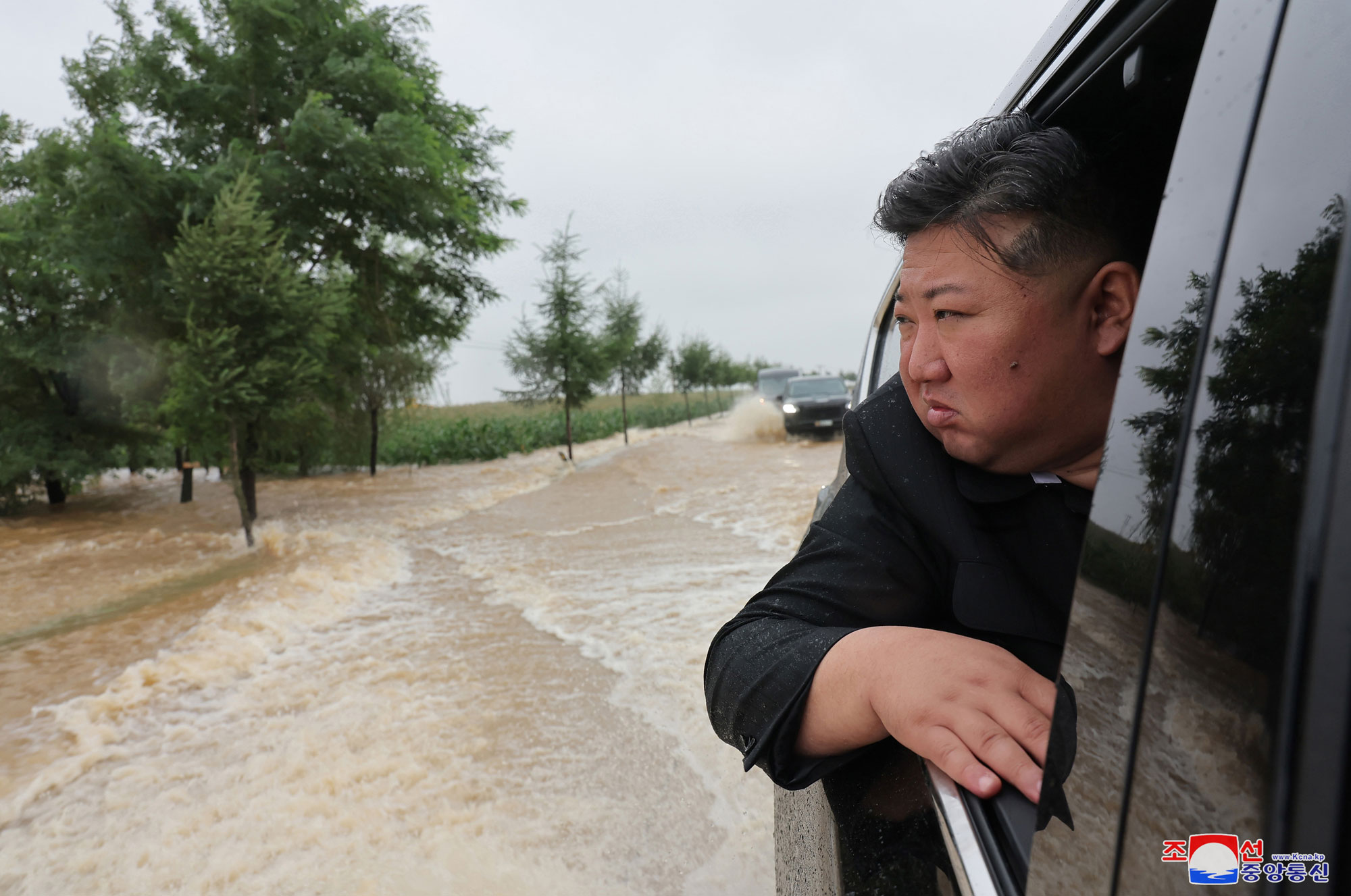 President of State Affairs <nobr><span style="font-size:110%;">Kim Jong Un</span></nobr> inspects flood-hit areas in city of Sinuiju and Uiju County of North Phyongan Province