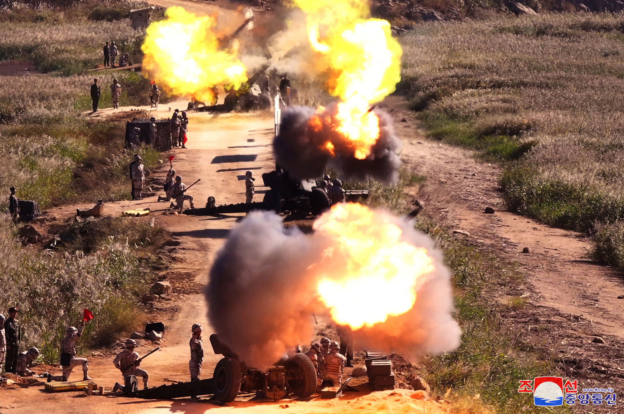 President of State Affairs <nobr><span style="font-size:110%;">Kim Jong Un</span></nobr> oversees live artillery firing drill of graduates of O Jin U Artillery Academy