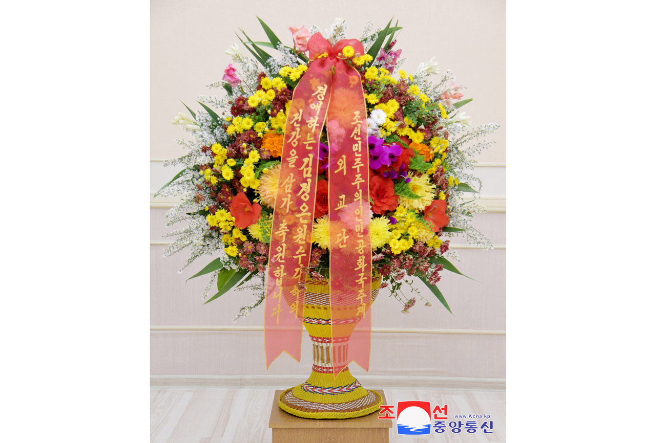 Floral baskets and letters to President of State Affairs Kim Jong Un