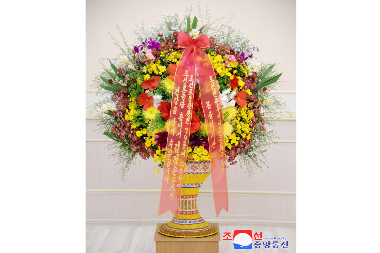 Floral baskets and letters to President of State Affairs Kim Jong Un