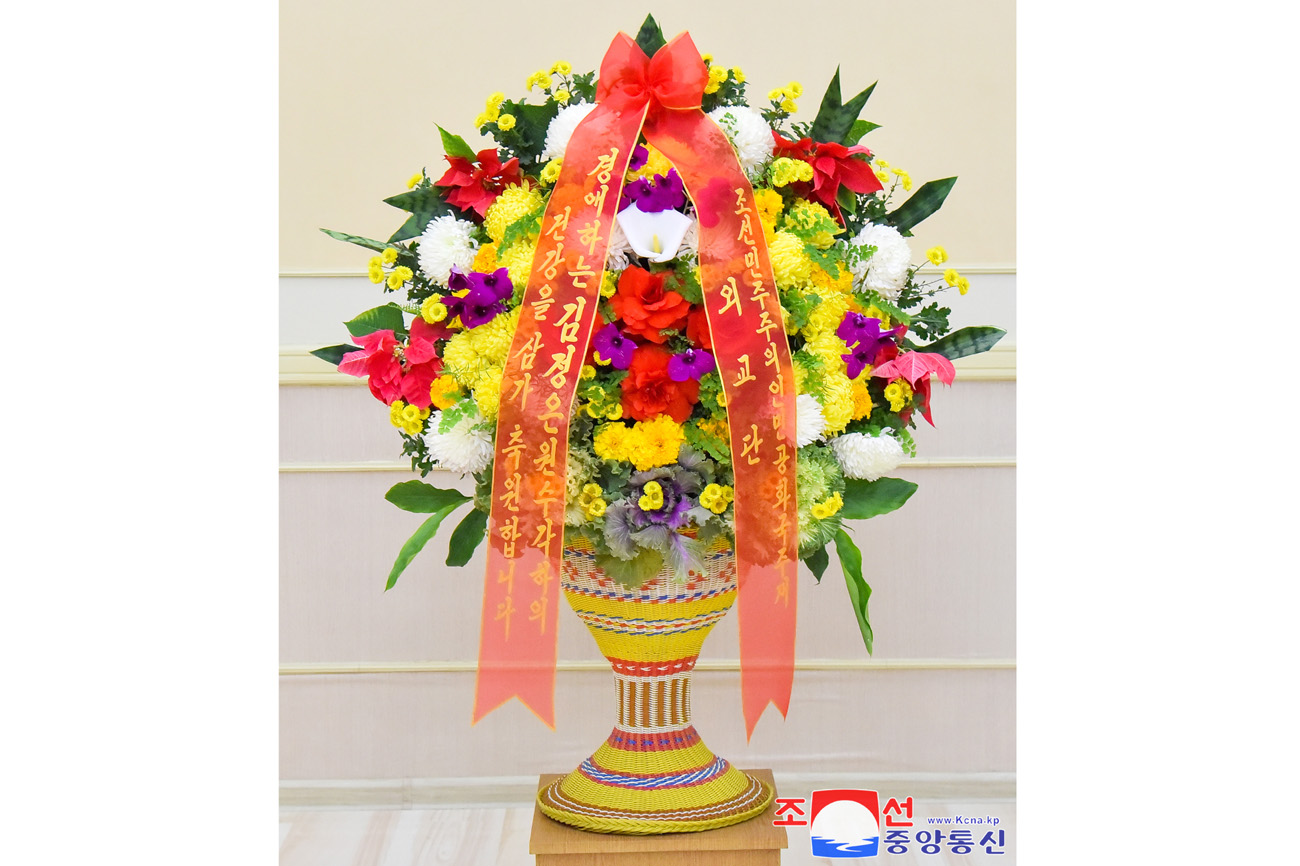 Floral basket and congratulatory letter to President of State Affairs Kim Jong Un from foreign diplomatic corps here