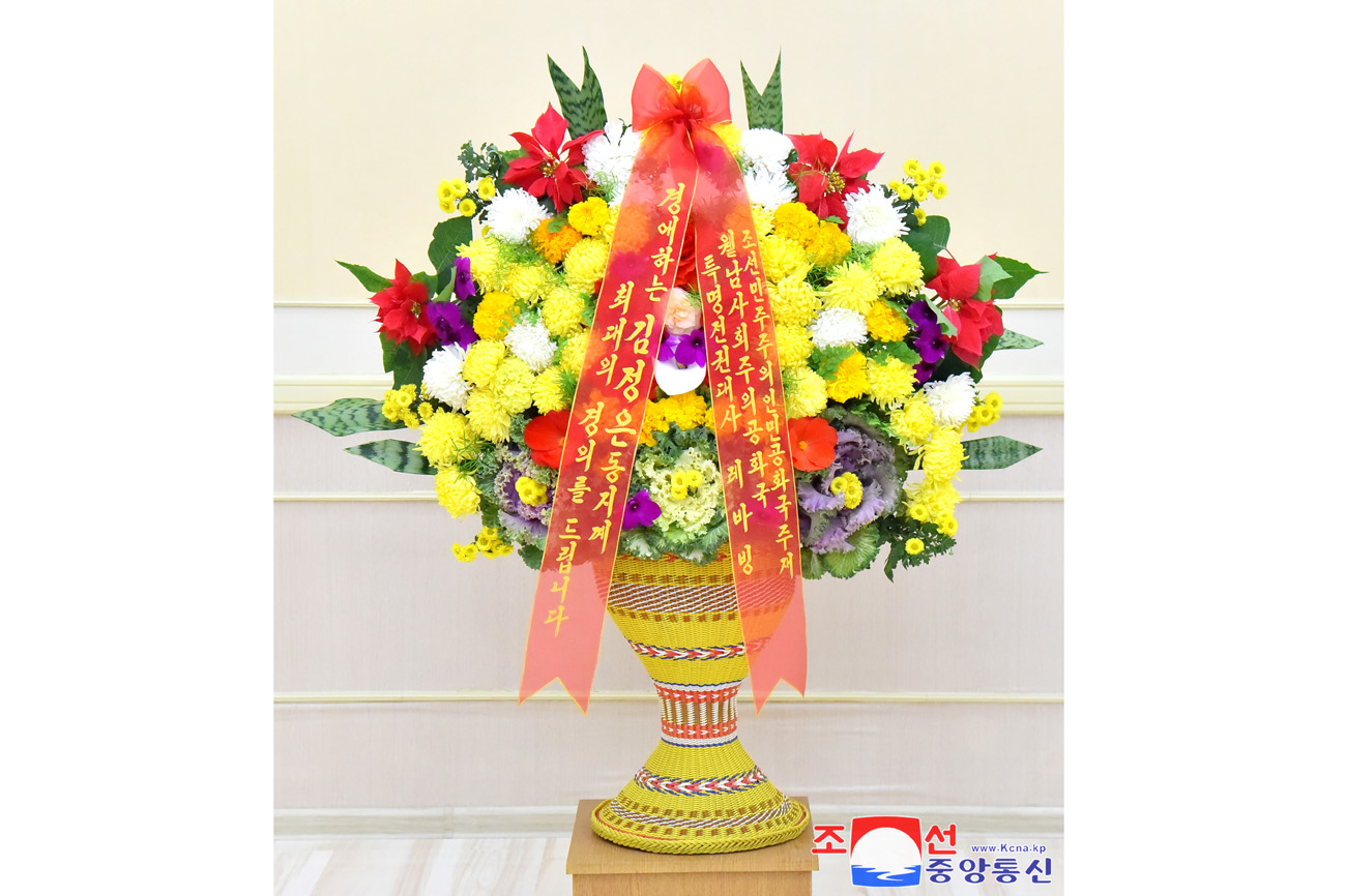 Floral basket and congratulatory letter to President of State Affairs Kim Jong Un from foreign diplomatic corps here