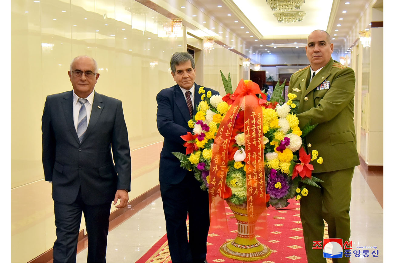 Floral basket and congratulatory letter to President of State Affairs Kim Jong Un from foreign diplomatic corps here