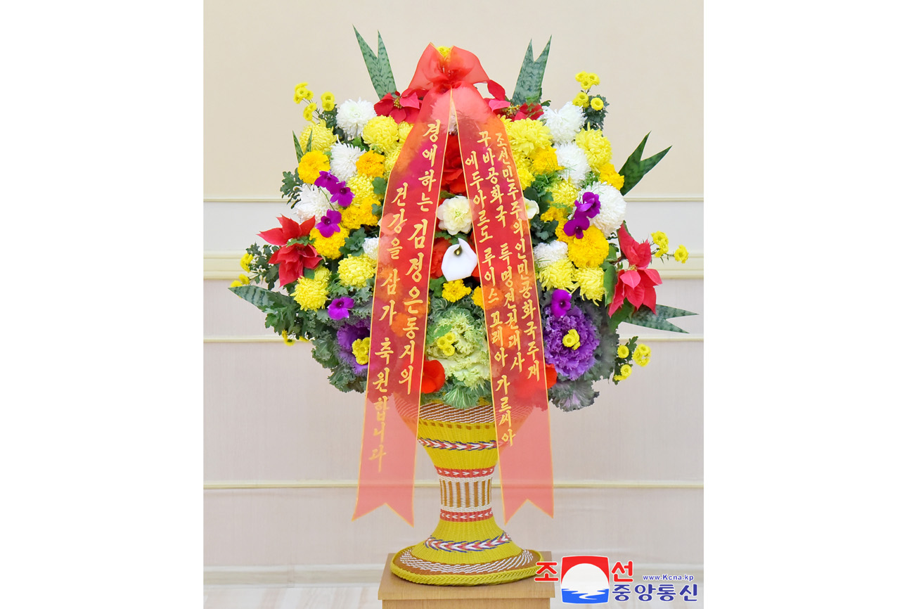 Floral basket and congratulatory letter to President of State Affairs Kim Jong Un from foreign diplomatic corps here