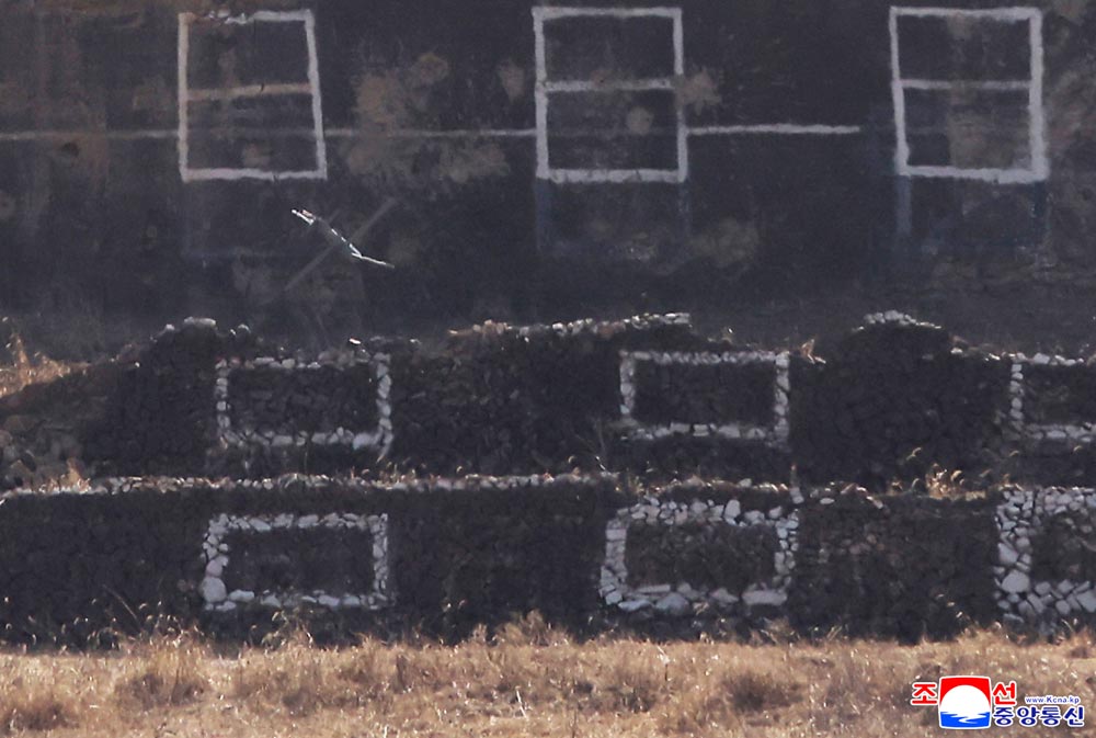 Respected Comrade&nbsp;Kim Jong Un oversees coordinated offensive tactical drill of infantrymen and tankmen