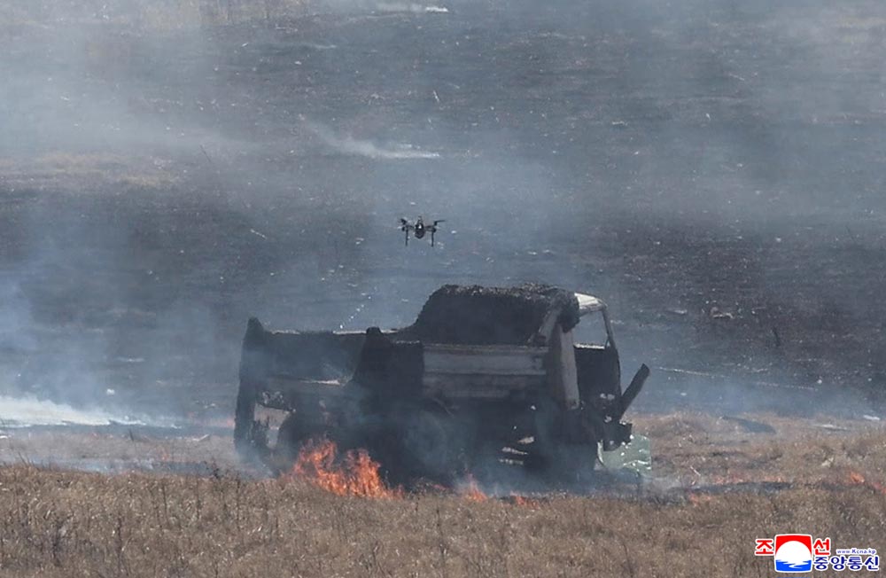 Respected Comrade&nbsp;Kim Jong Un oversees coordinated offensive tactical drill of infantrymen and tankmen