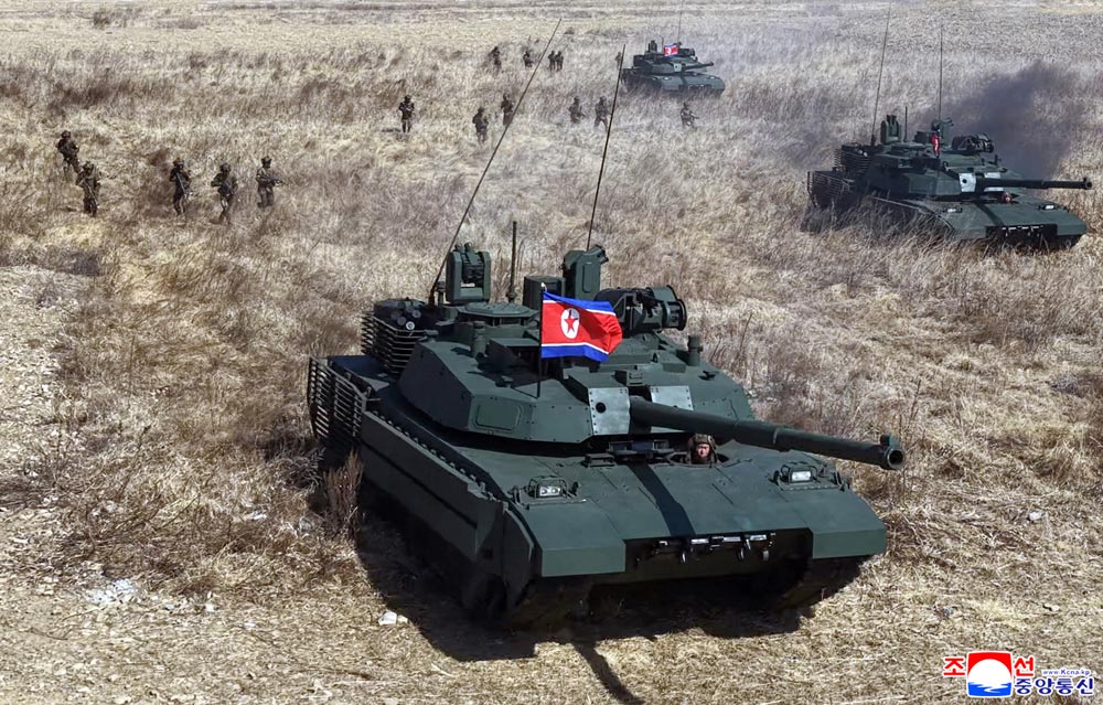 Respected Comrade&nbsp;Kim Jong Un oversees coordinated offensive tactical drill of infantrymen and tankmen