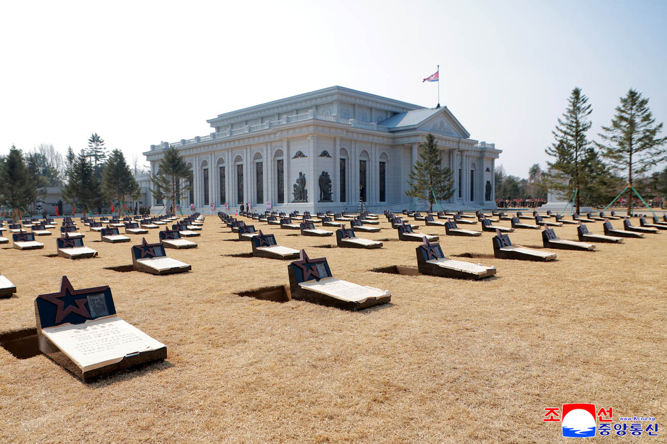 Turf planted in yard with tombs of heroes of Memorial Museum of Combat Feats at Overseas Military Operations